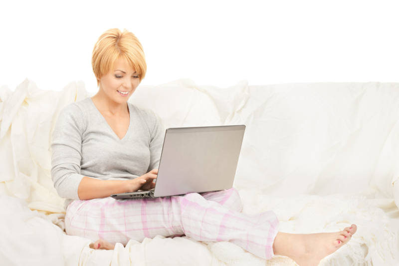 bright picture of happy woman with laptop computer